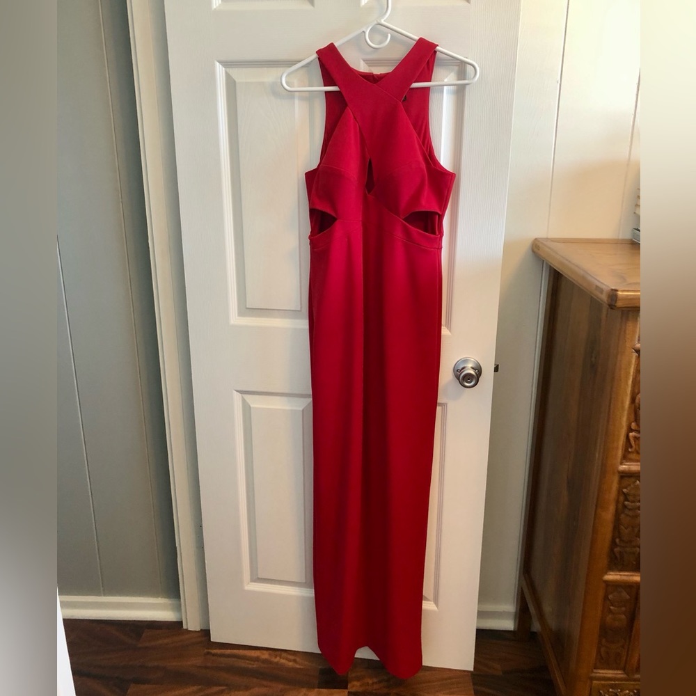 Aidan Mattox size 8 red crepe cutout long gown. Padded cups, lined, back slit.